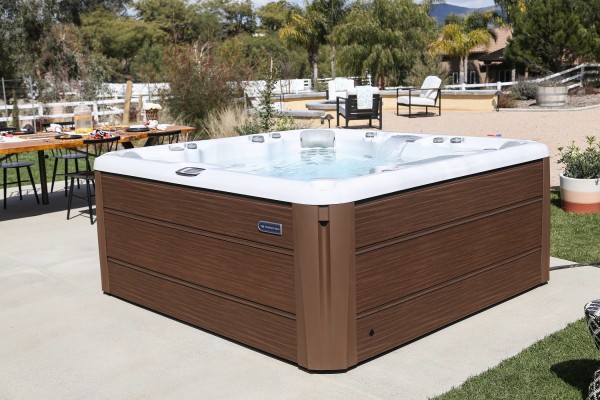 Outdoor hot tub installation on a concrete slab. Outdoor hot tub installation on a concrete slab.