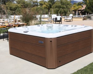 Outdoor hot tub installation on a concrete slab.