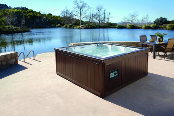 Outdoor hot tub installation by the water.