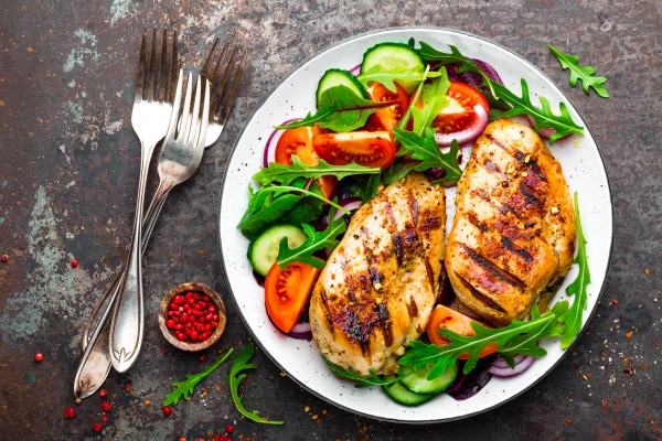 Healthy meal of chicken and salad.