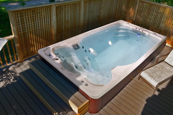 SwimLife Swim Spa installation on a deck.